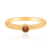 Gouden ring met een oranje saffier