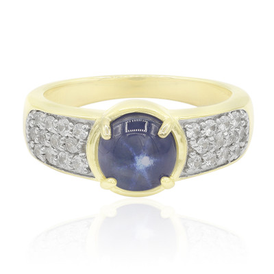 Gouden ring met een blauwe ster saffier