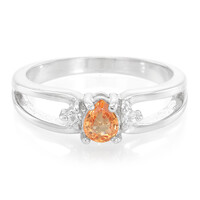 Zilveren ring met een oranje saffier