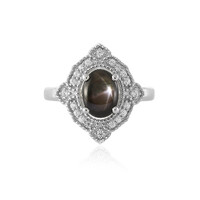 Zilveren ring met een zwarte ster saffier
