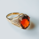 Gouden ring met een hessoniet granaat