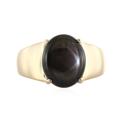 Gouden ring met een zwarte ster saffier