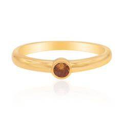Gouden ring met een oranje saffier