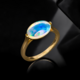 Gouden ring met een AAA Welo-opaal (de Melo)