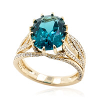 Gouden ring met een caribisch blauwe apatiet (de Melo)