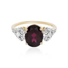Gouden ring met een magenta granaat