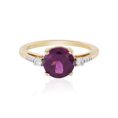 Gouden ring met een magenta granaat