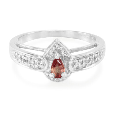 Zilveren ring met een oranje saffier