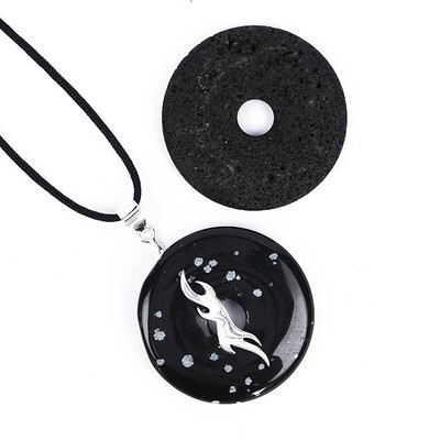 Zilveren accessoire met een lava parel