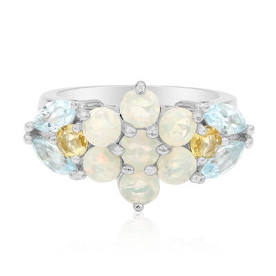 Zilveren ring met hemel-blauwe topaasstenen