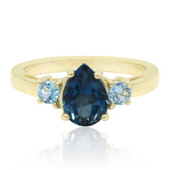Gouden ring met een Londen-blauwe topaas