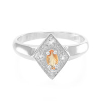 Zilveren ring met een oranje saffier