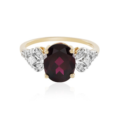 Gouden ring met een magenta granaat