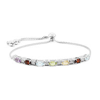 Zilveren armband met hemel-blauwe topaasstenen