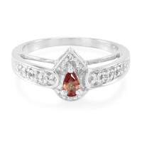 Zilveren ring met een oranje saffier
