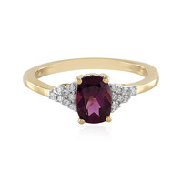 Gouden ring met een magenta granaat