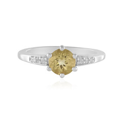 Zilveren ring met een gele beril