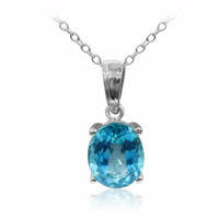 Zilveren halsketting met een Paraiba-blauwe topaas