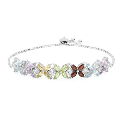Zilveren armband met hemel-blauwe topaasstenen