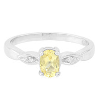 Zilveren ring met een gele beril
