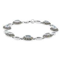 Zilveren armband met hemel-blauwe topaasstenen