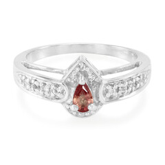 Zilveren ring met een oranje saffier