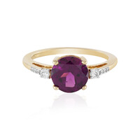 Gouden ring met een magenta granaat
